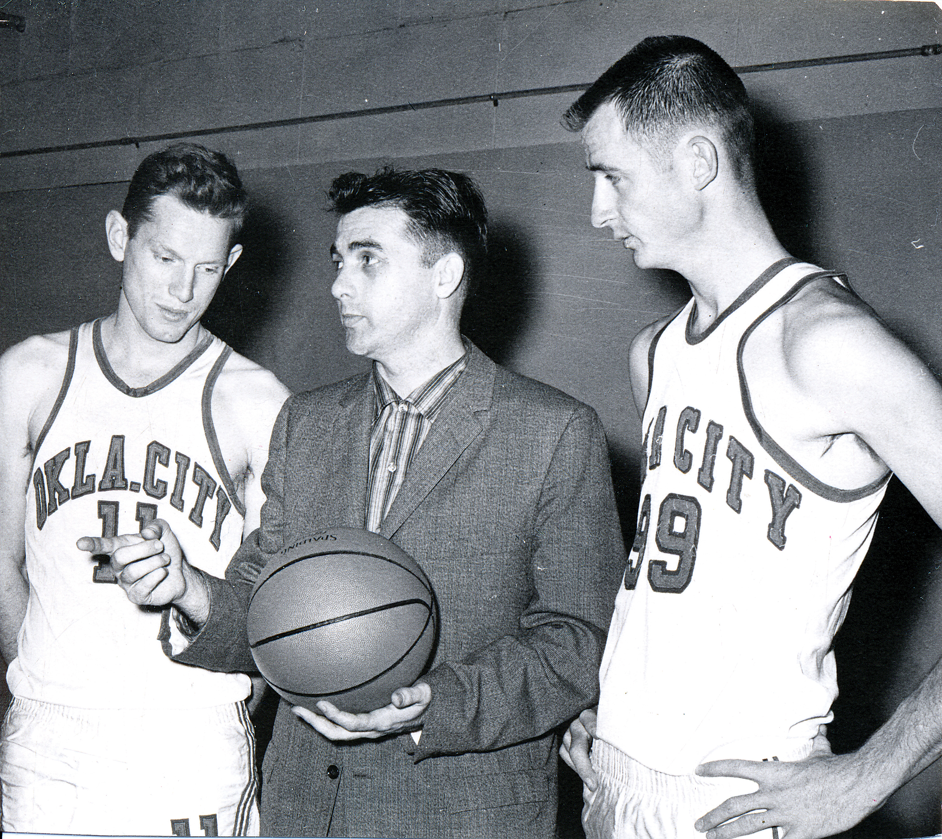 Reed during his days at Oklahoma City University with legendary coach Abe Lemons (center). (Courtesy photo)