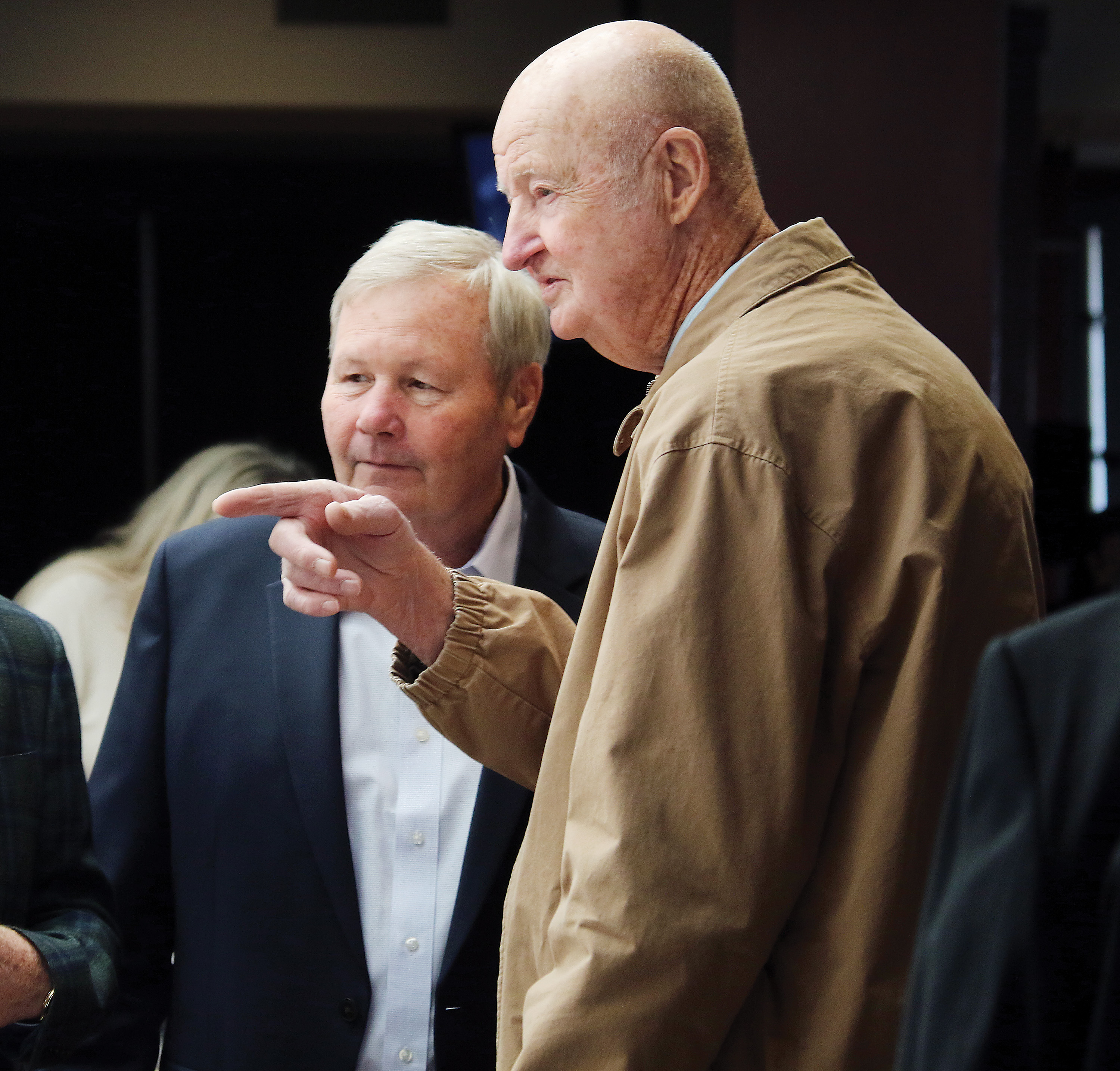 Hub Reed, right, points someone out in the crowd to El Reno's Bill Reeves during the announcement ceremony for the Class of 2020 to be inducted into the Oklahoma Sports Hall of Fame. (Tribune photographer/Glen Miller)