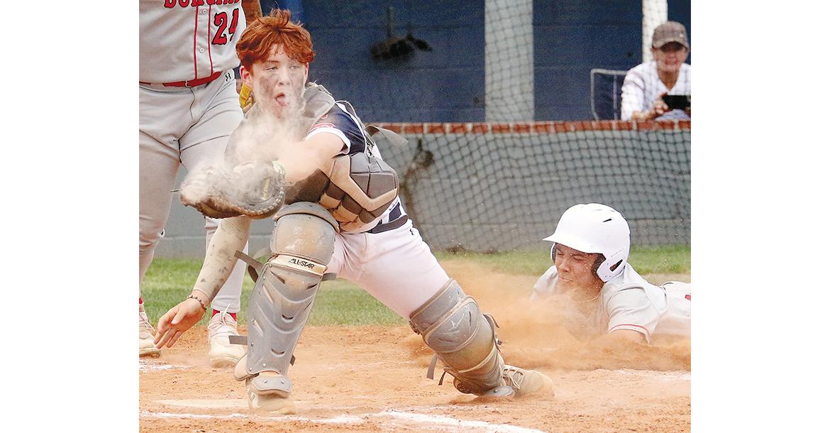 Austin Steffler squeezes a throw to the plate as a Duncan player slides into home_slideshow